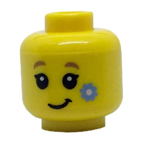 LEGO Minifigure, Head Female with Dark Tan Eyebrows, Black Eyes and Eyelashes, Lopsided Grin, Bright Light Blue Flower on Cheek Pattern - Hollow Stud 3626CPB1817